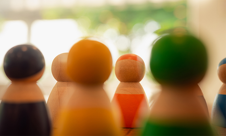 Multi-colored models stand together and discuss their work. Diverse group of stylish people standing together. Society or population, social diversity concepts. Multi-colored models stand together and discuss their work. Diverse group of stylish people standing together. Society or population, social diversity concepts.